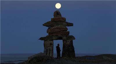 Inukshuk and moon